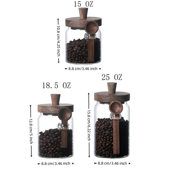 Close-up of glass storage jars with wooden lids on dark background